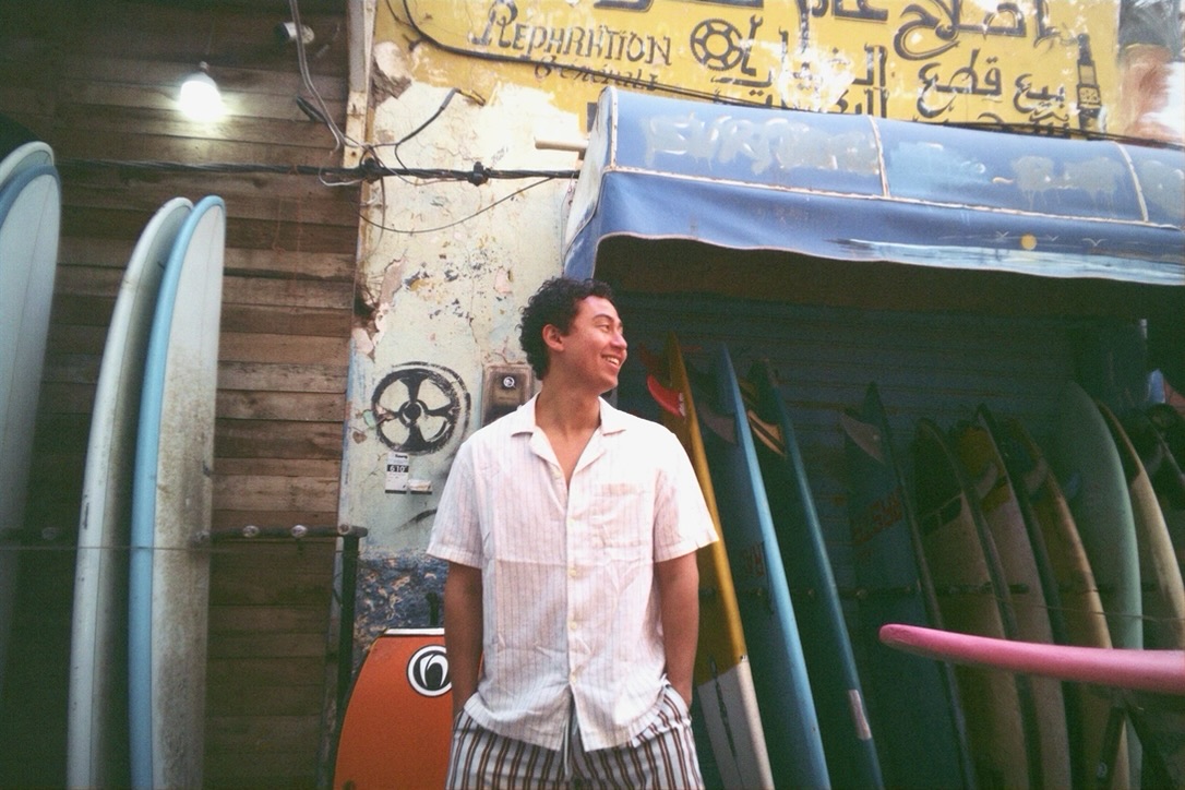 Tatsuki Thomas outside a surf shop